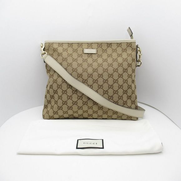 GG Emblem Mini shoulder bag in beige - Gucci | Mytheresa Gucci Canvas Beige GG Shoulder Bag